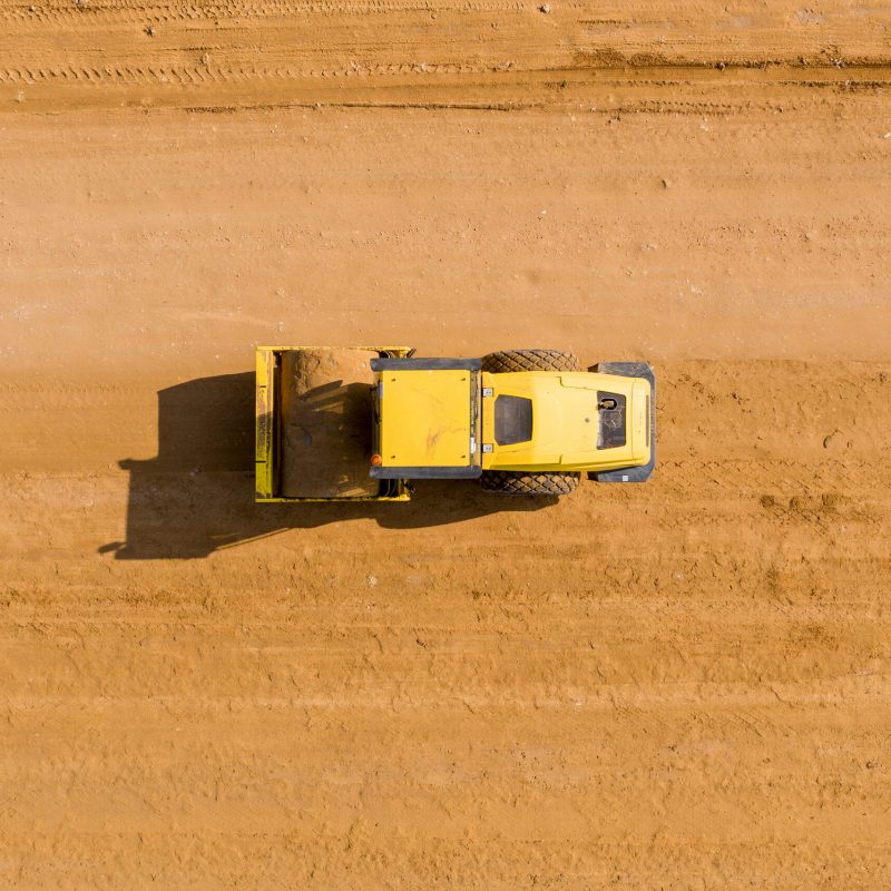 Asphalt,Roller,Pressing,A,New,Road,,Aerial,Image.