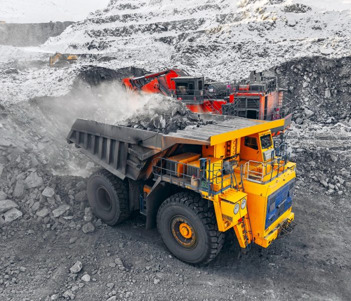 Open,Pit,Coal,Mine,With,Heavy,Machinery,Truck,In,Winter