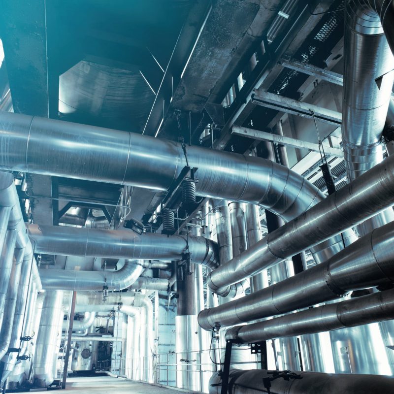 Equipment,,Cables,And,Piping,As,Found,Inside,Of,A,Modern